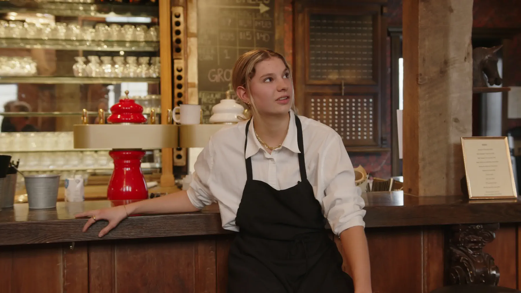 Hospitality service interview frame from Vintage Rebel development footage.