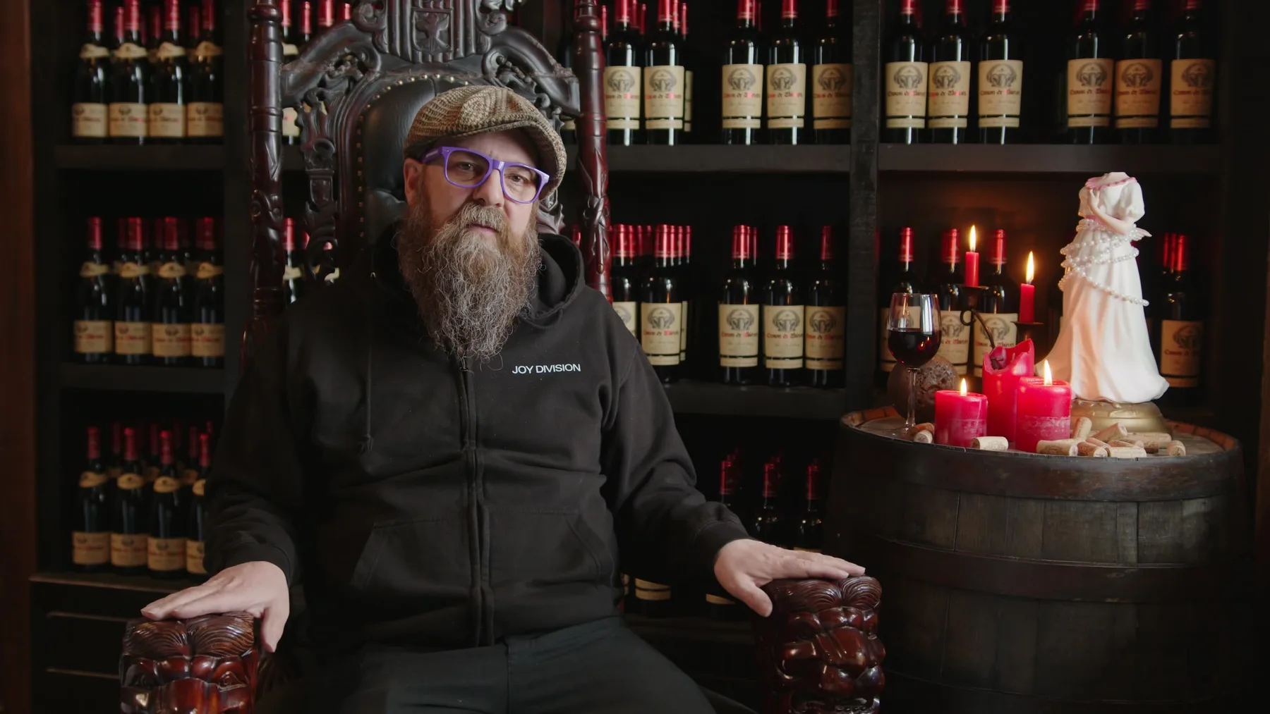 Jason Parkes seated in a wine room interview setup for Vintage Rebel.